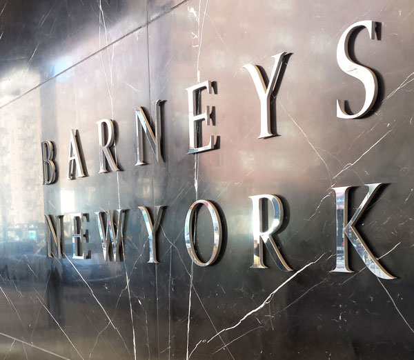 Barneys striking black marble facade facing out onto Seventh Avenue between 16th and 17th Streets in Chelsea.